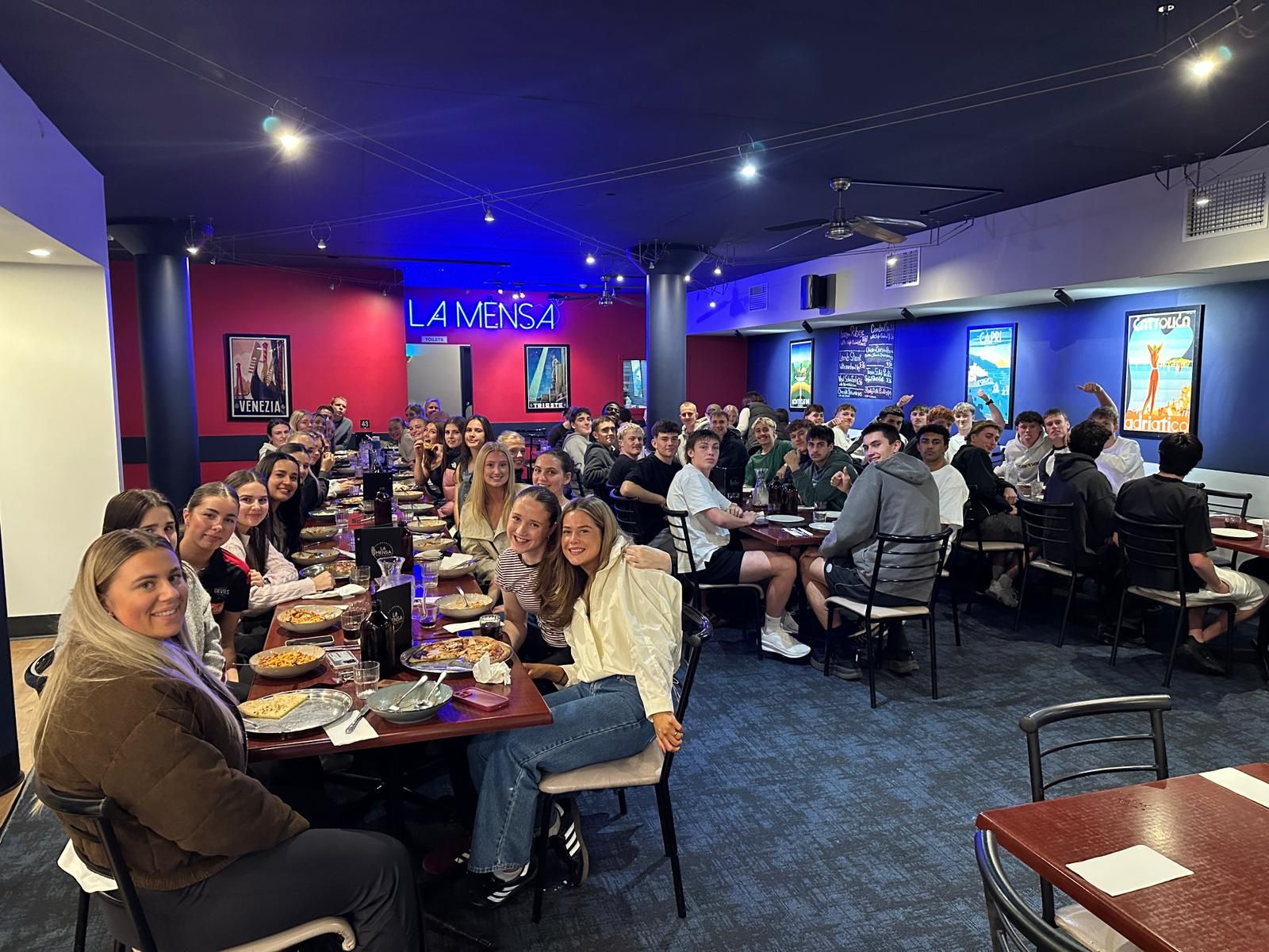 A large group dining at La Mensa, Salamanca Place, Hobart